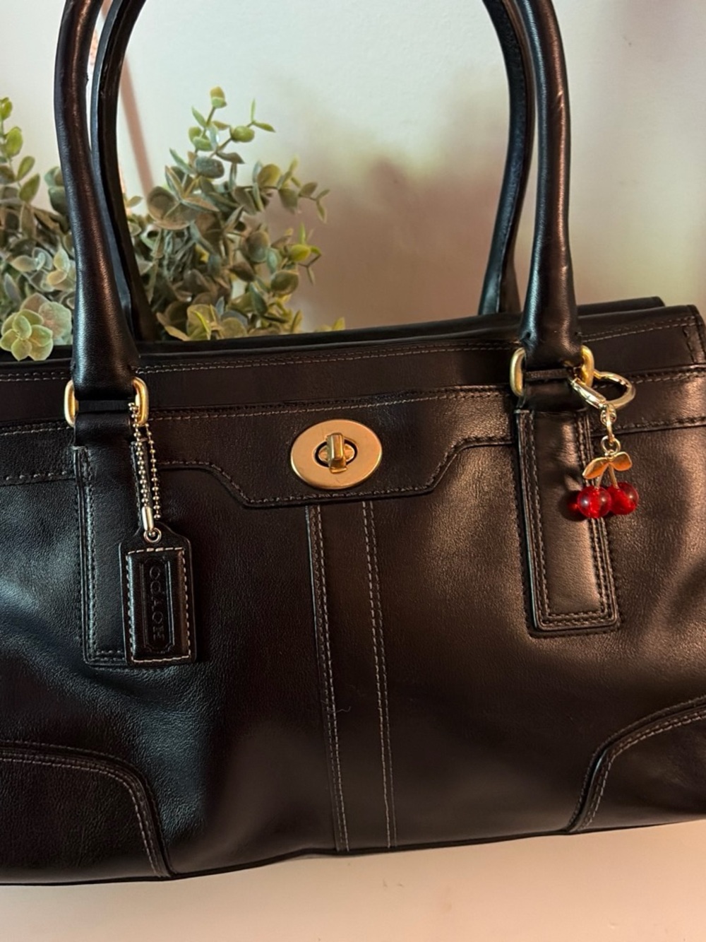 Coach Black Leather Satchel with Gold Hardware and Red Cherry Charm
